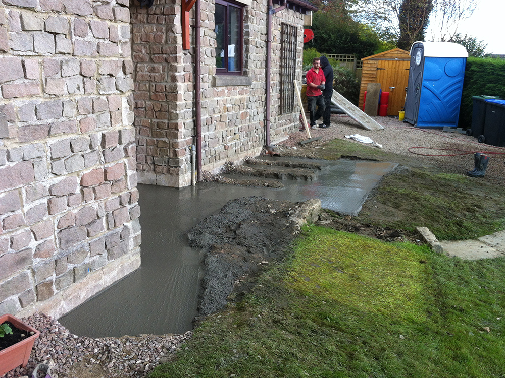 Underpinning to house and garage